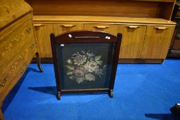 A vintage mahogany tapestry fire screen, approx 72 x 59cm