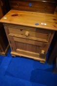 A natural pine bedside cabinet, approx. H59 W46 D38cm