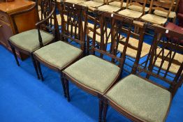 A set of four (three plus one) 19th Century dining chairs in the classical style
