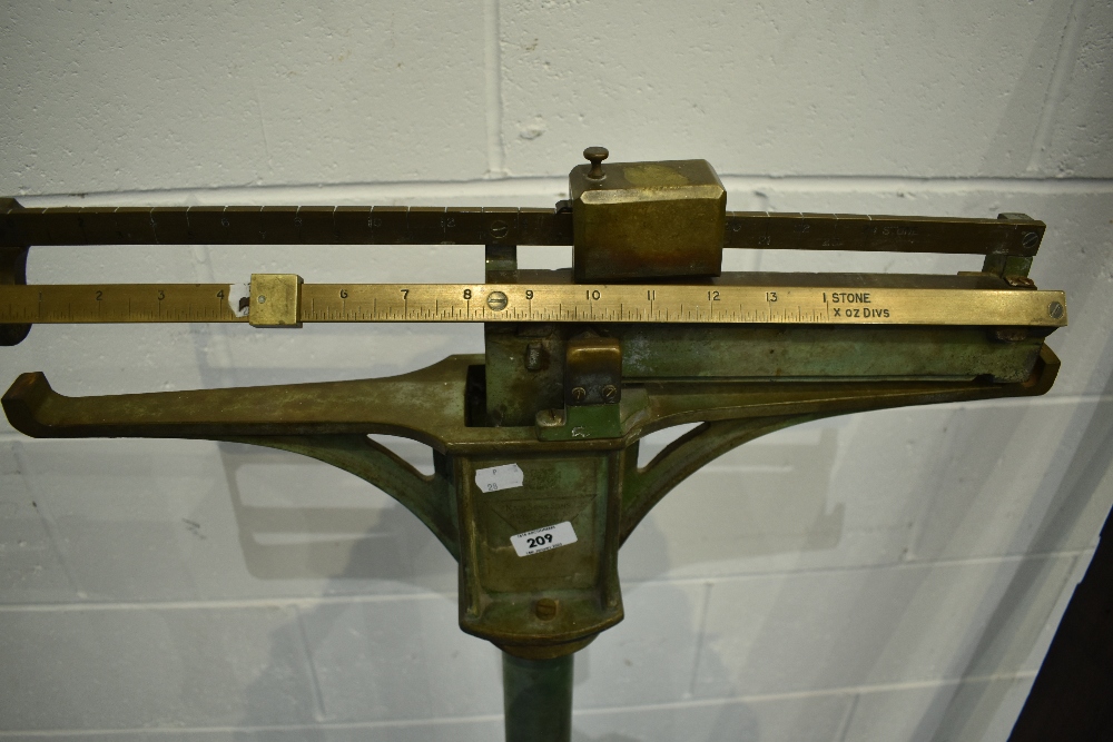 A vintage cast iron balance scale, possibly doctors or similar
