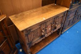 A Titchmarsh and Goodwin Elizabethan style oak sideboard / Credence cabinet, W 103, D 40, H 75cm.