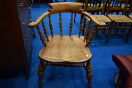 A 19th Century smokers bow armchair