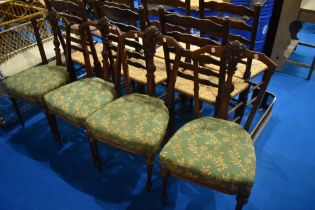 A set of four Victorian mahogany salon chairs