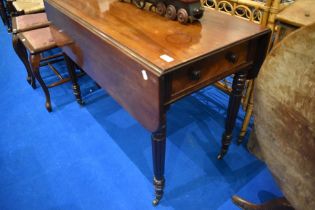A Regency mahogany Pembroke table in the Gillows style having reeded legs, approx dimensions