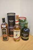 Three bottles of Irish Whiskey, Connemara Peated Single Malt, 40% vol, 70cl in card tube, Black Bush