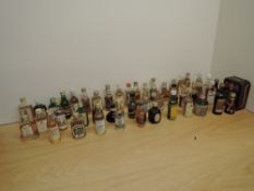 A collection of Blended Whisky Miniatures including Ballantines, White Horse, Dufftown Glenlivet,