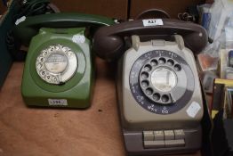 Two vintage mid century rotary dial telephones, having been converted.