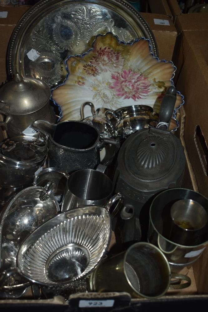 An assortment of plated and pewter items including sauce jugs, sugar bowls and milk jugs and a