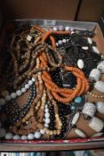 A selection of beaded necklaces, including rustic styles.