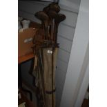 A collection of vintage hickory shafted golf clubs in case.