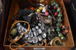 An assorted collection of costume jewellery, including beaded necklaces