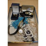 An assorted collection of jewellery and watches, to include simulated pearl necklaces,