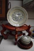 A Chinese plate, having fish decoration, AF and similarly styled lidded pot of small proportions,