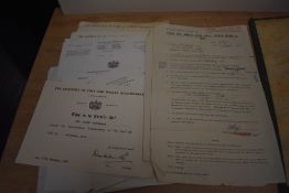 A folder containing various ephemera, pertaining to Ian Ralph Henderson, to include Navy entrance