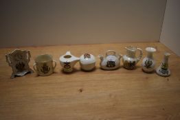 A group of assorted crested ware, to include a Blackpool Progress clock ornament, a Sheffield double