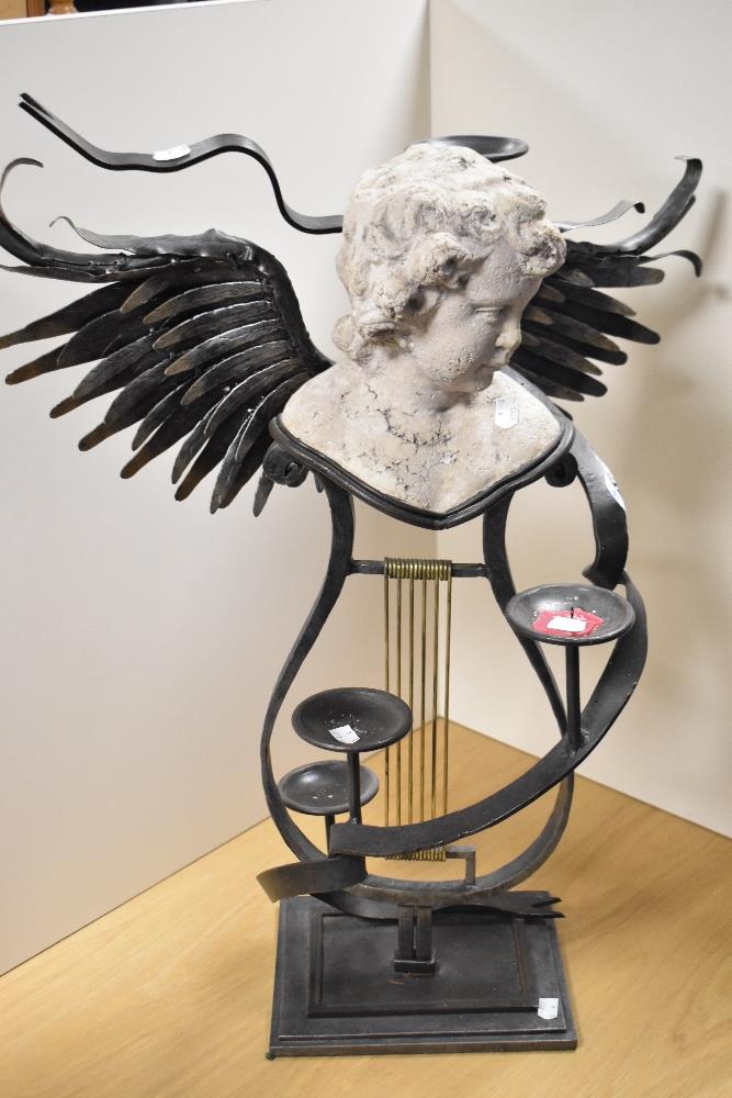 A bespoke Neoclassical Revival style candle stand, wrought iron and winged, having a central, - Image 2 of 5