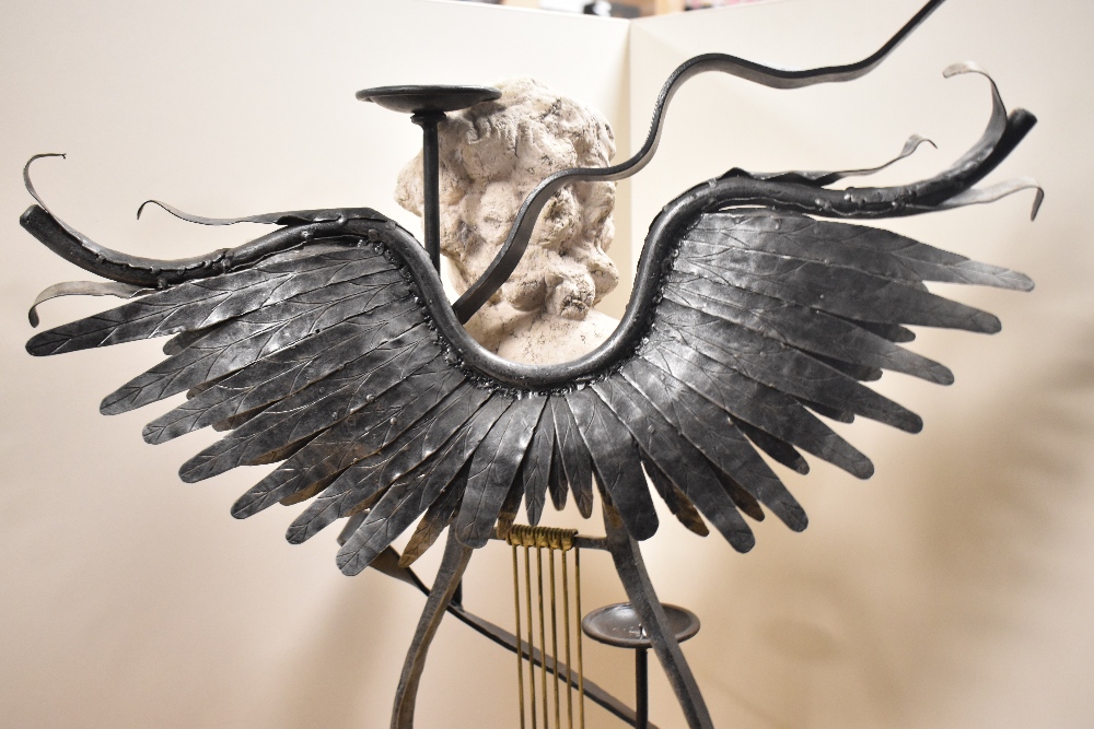 A bespoke Neoclassical Revival style candle stand, wrought iron and winged, having a central, - Image 5 of 5