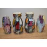 Two West German vases and two J Fryers old court vases, all having colourful lustre glazes.