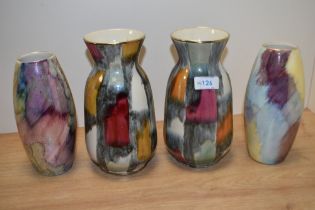 Two West German vases and two J Fryers old court vases, all having colourful lustre glazes.