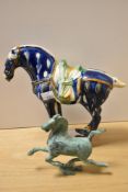 A Chinese Tang style glazed pottery horse, with faint impressed mark to base, measuring 22cm tall,