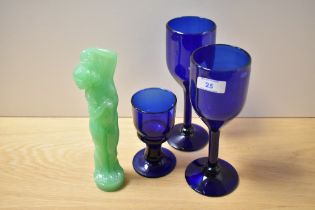 An Art Deco uranium glass figural ornament, possibly Jobling & Co., measuring 25cm tall, two Bristol