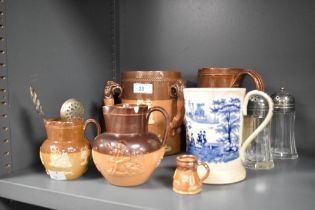 A group of 19th Century Doulton ware, including a Lambeth stoneware tyg with figural handles, a salt