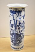 A 19th Century Chinese blue and white cylindrical vase, decorated with flowering branches, &