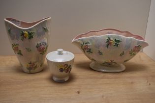 Two Maling ware vases having lustre finish with floral sprigs and a similar trinket pot.
