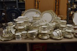 A collection of Minton 'Aragon' dinner service, including tureen, cups and saucers, platters, soup