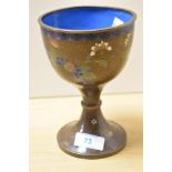 A Chinese Cloisonne enamelled goblet, brown with floral motifs, measuring 16cm tall