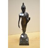 A 19th/20th Century spelter Standing Buddha ornament, measuring 44cm tall