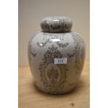 A 19th/20th Century crackle glazed ginger jar with cover, decorated in a Neoclassical style