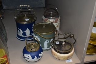 A collection of biscuit barrels and sugar basins, including Adams and Wedgwood Jasper ware, also