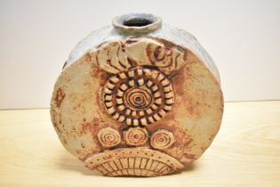 A mid-20th Century Troika style wheel vase, of brutalist design, measuring 26cm tall, showing some