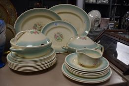 A collection of Susie Copper 'Dresden', including tureens, plates and platters, having cream