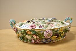 A Regency Period Minton style porcelain pot pourri dish and cover, decorated with intricately