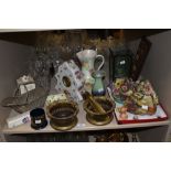 A selection of vintage items, including cut glass vase, ceramic clock with floral decoration,