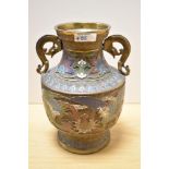 A Chinese brass cloisonné enamelled vase, having bird and foliate decoration, with scrolled