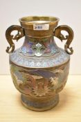 A Chinese brass cloisonné enamelled vase, having bird and foliate decoration, with scrolled