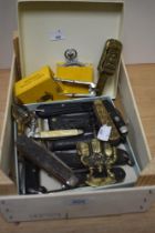 A selection of vintage pen knives, bottle openers and cork screw, nutcracker and stopwatch.