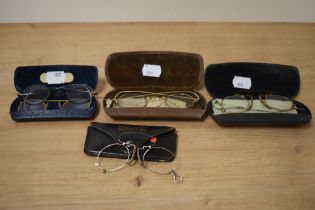 A collection of antique Pince-nez and spectacles.