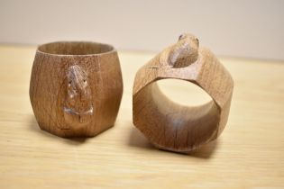 A pair of Robert Thompson of Kilburn Mouseman napkin rings, of octagonal form, each with carved