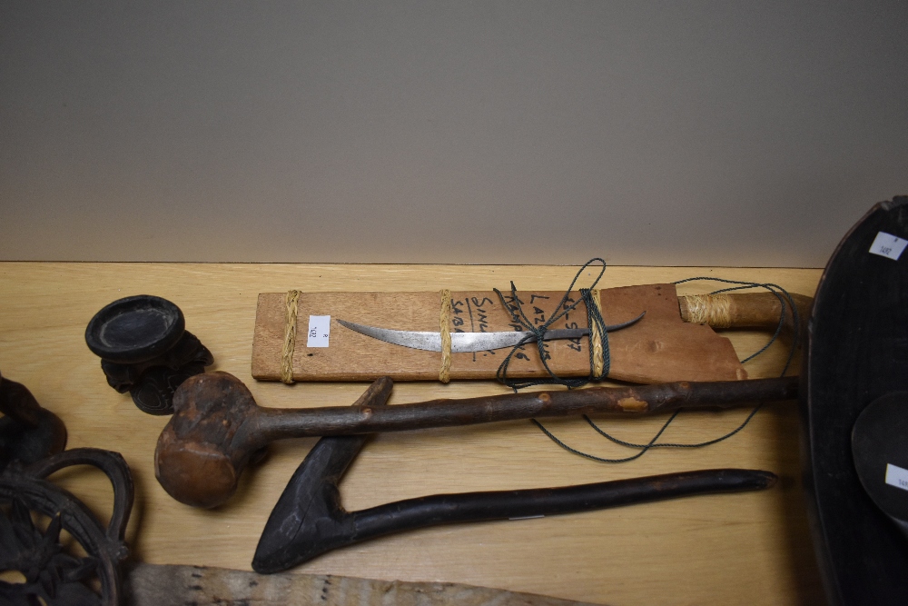 An assorted collection of primitive African tools and carvings, including a hardwood club - Image 11 of 13