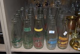 A collection of advertising milk bottles, including Presall, Alston and Helmshore interest.