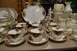 A selection of Royal Albert 'Old Country Roses' cups and saucers, jug, sugar basin and cake plate.
