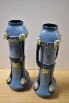 A pair of 19th Century continental/ Bohemian Secessionist pottery vases, decorated in a blue