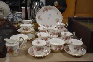 A selection of Royal Albert 'Lavender Rose' cups, saucers, cake plate, sugar basin and cream jug,