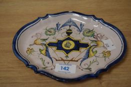 A continental faience shallow dish of shaped form.