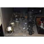 A selection of pewter tankards and a jug, plated ware including tea pot, sugar and milk, sold with