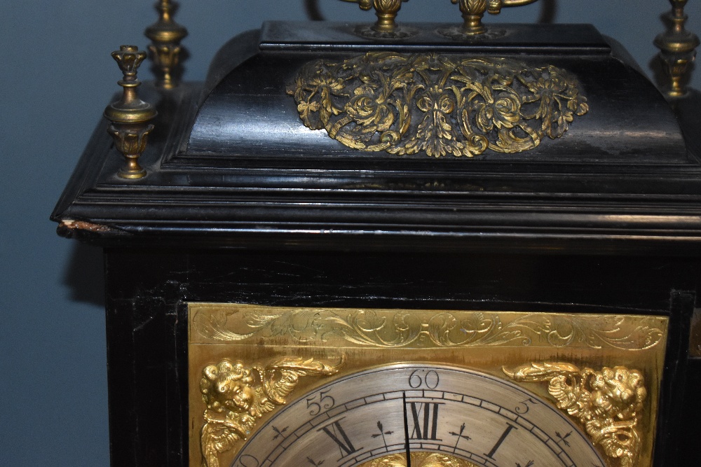 A late 17th Century ebonised bracket clock, John Clowes of London, the case having a caddy top, - Image 21 of 24